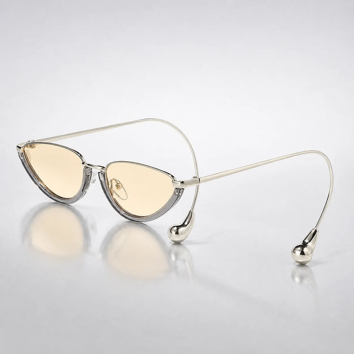 Halvra Cat-Eye Sunglasses — Transparent Gray Framed Champagne Slices (sunglasses hero)